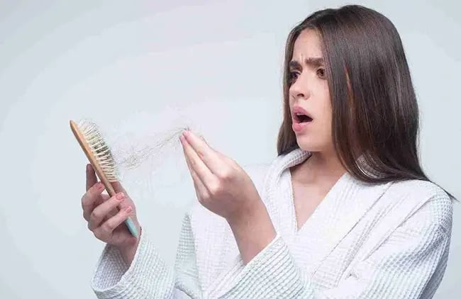 Postpartum & Hormonal Hair Loss in Women