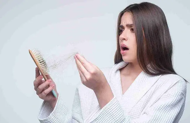 Postpartum & Hormonal Hair Loss in Women: Modern Treatments That Restore Confidence